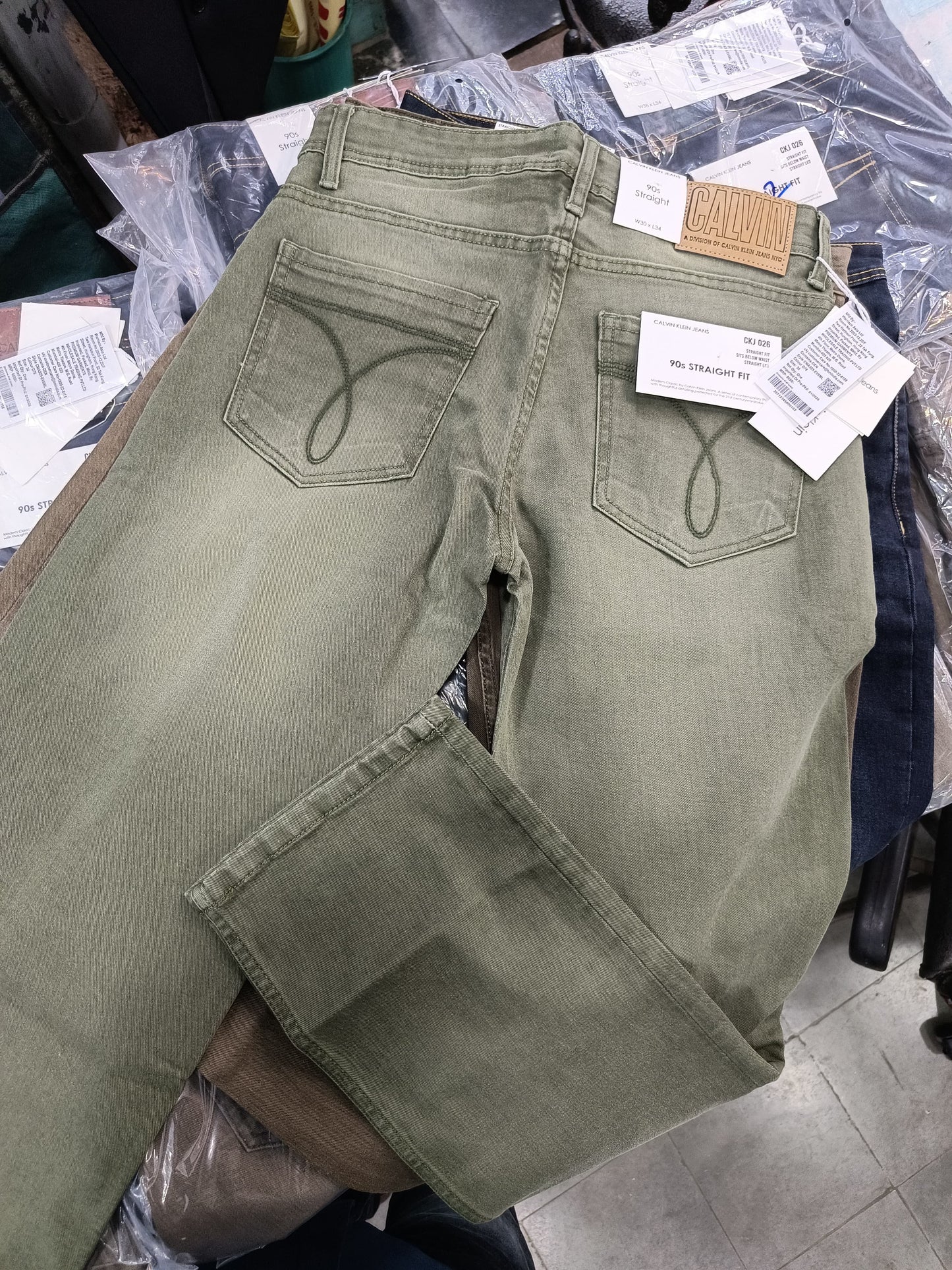 CK CALVIN KLEIN GREEN WASH JEANS